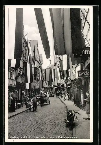 AK Marburg a. d. Lahn, Barfüsserstrasse im Fahnenschmuck, Motorrad