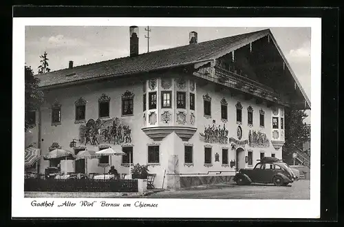 AK Bernau / Chiemsee, Gasthaus-Metzgerei Alter Wirt, Aussenansicht mit Terrasse