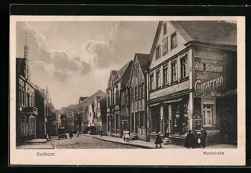 AK Beckum, Nordstrasse mit Geschäft von Wilhelm Schwinn und Passanten