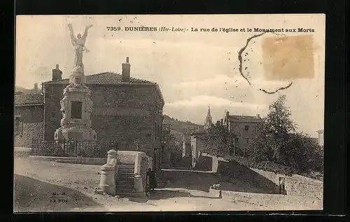 AK Dunières, La rue de l`eglise et le Monument aux Morts