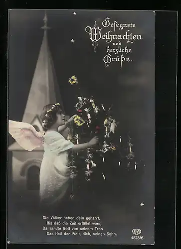 AK Weihnachtsengel dekoriert den Christbaum