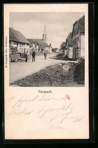 AK Carspach, Strassenpartie mit Kirche