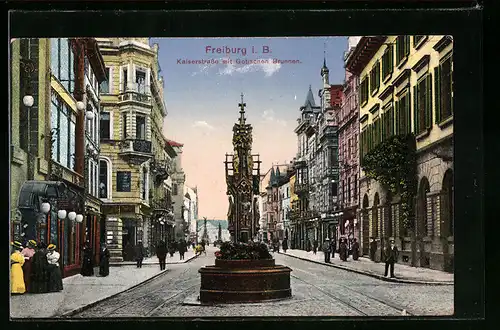AK Freiburg i. B., Kaiserstrasse mit Gotischem Brunnen