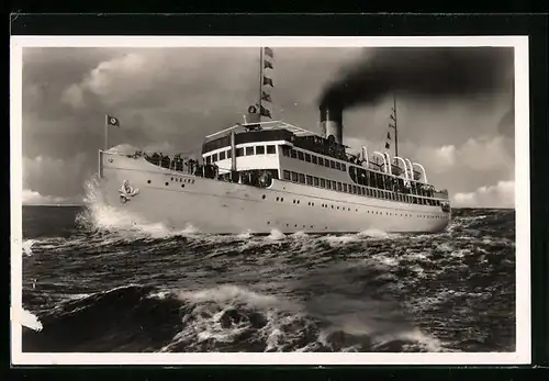 AK Ostsee-Dampfer SS Rugard in stürmischer See, flagge