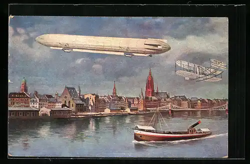 AK Zeppelinfahrt über die Stadt in Begleitung eines Flugzeuges