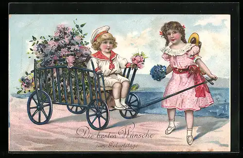 AK Glückwunsch zum Geburtstag, Bub und Mädchen mit Bollerwagen voller Blumen