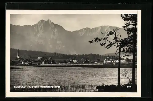 AK Seefeld i. T., Ortspanorama gegen Wettersteingebirge