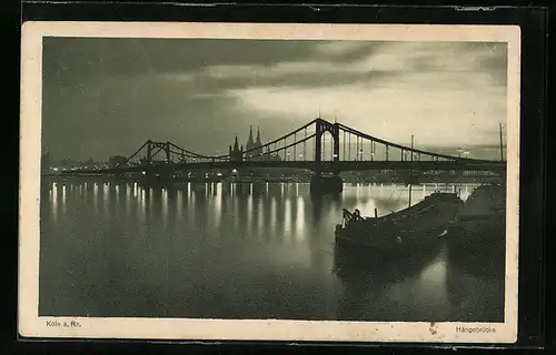 AK Köln a. Rh., Hängebrücke am Abend