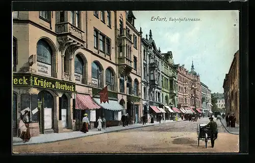 AK Erfurt, Bahnhofstrasse mit Geschäft Krüger & Oberbeck