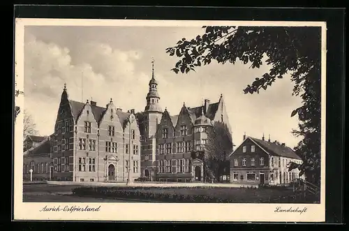 AK Aurich / Ostfriesland, Gebäudeansicht Landschaft