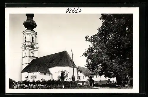 AK Faistenau b. Salzburg, Strassenpartie mit Kirche