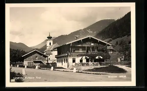 AK Landl bei Kufstein, Strassenpartie mit Gasthof zum Krämerwirt