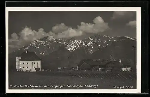AK Saalfelden, Dorfheim mit den Leoganger Steinbergen aus der Vogelschau