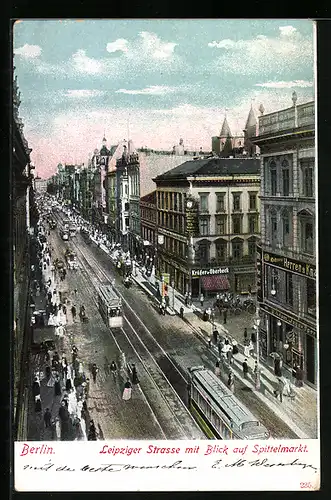 AK Berlin, Leipziger Strasse mit Geschäften, Strassenbahn und Blick auf Spittelmarkt