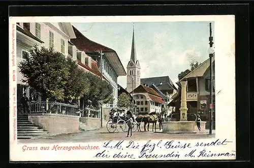 AK Herzogenbuchsee, Strassenpartie mit Brunnen und Pferdewagen