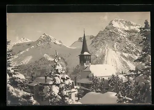 AK Arosa, Teilansicht mit Kirche und Bergpanorama im Winter