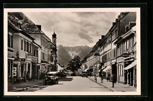 AK Murnau a. Staffelsee, Hauptstrasse mit Geschäften