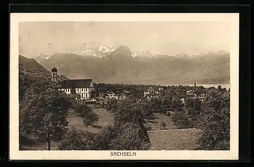 AK Sachseln, Blick zur Kirche im Ort gegen die Alpen