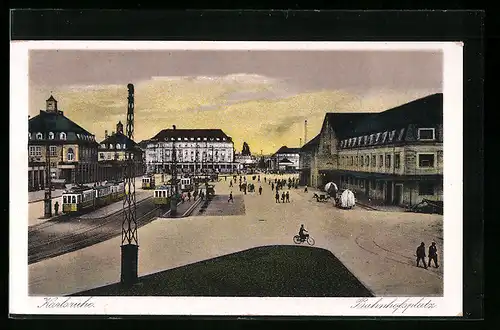 AK Karlsruhe, Bahnhofsplatz mit Strassenbahnen