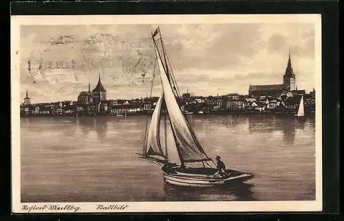 AK Rostock in Meckl., Stadtbild mit Segelschiff auf der Ostsee