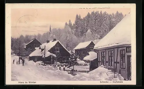 AK Schierke im Harz, die Dorfstrasse im Schnee