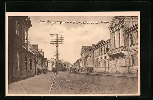 AK Mitau, Strassenpartie mit Kriegslazarett und Postgebäude