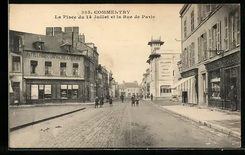 AK Commentry, La Place du 14 Juillet et la Rue de Paris