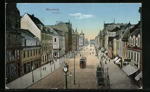 AK Mannheim, Strasse mit Hotel Garni und Strassenbahn, Planken