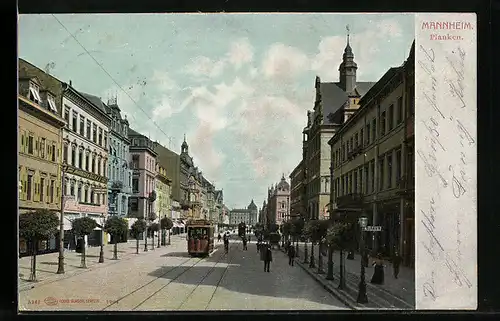 AK Mannheim, Strasse Planken mit Geschäften und Strassenbahn