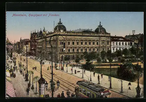 AK Mannheim, Hauptpost mit Planken und einer Strassenbahn im Vordergrund