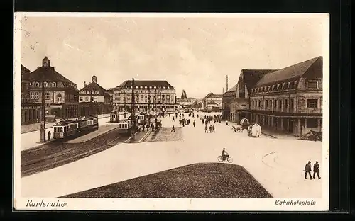 AK Karlsruhe, Bahnhofsplatz mit Strassenbahn
