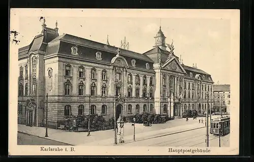 AK Karlsruhe i. B., Hauptpostgebäude mit Strassenbahn