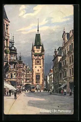 Künstler-AK Freiburg, Strassenpartie am Martinstor mit Strassenbahn