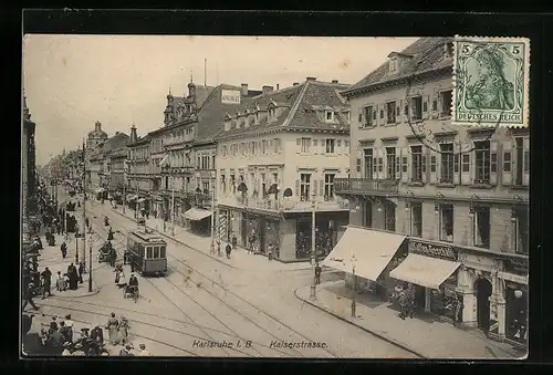 AK Karlsruhe i. B., Kaiserstrasse mit Geschäften und Strassenbahn