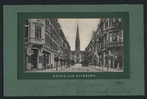 AK Duisburg, Strassenpartie mit Blick zur Kirche