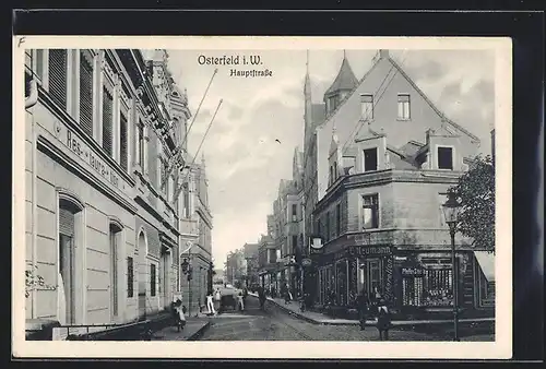 AK Osterfeld i. W., Hauptstrasse mit Restaurant und Zigarrengeschäft von E. Neumann