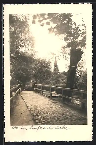 Foto-AK Warin, Blick von der Seufzerbrücke zum Kirchturm