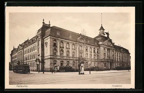 AK Karlsruhe, Hauptpost mit Strassenbahn und Litfasssäule