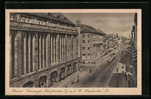 AK Karlsruhe i. B., Strassenpartie mit Union Vereinigte Kaufstätten G.m.b.H.