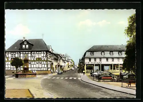 AK Usingen im Taunus, Cafe zum Schloss am Schlossplatz mit Strassenpartie