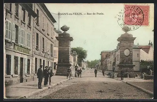 AK Magny-en-Vexin, Rue de Paris, Strassenpartie