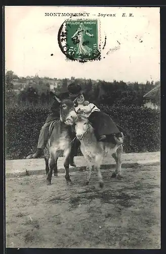 AK Montmorency, Joyeux, Paar auf Eseln