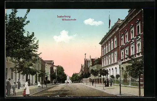 AK Insterburg, Wilhelmstrassse mit Passanten