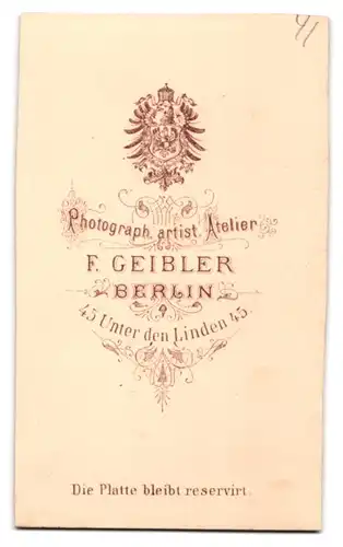 Fotografie F. Geibler, Berlin, Unter den Linden 45, junger preussischer Eisenbahner in Uniform mit Locken