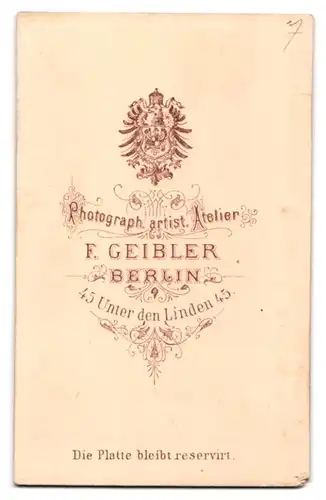 Fotografie F. Geibler, Berlin, Unter den Linden 45, älterer Beamter der preussischen Eisenbahn in Uniform mit Vollbart