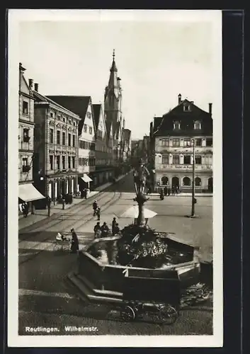 AK Reutlingen, Wilhelmstrasse mit Kachelscher Apotheke