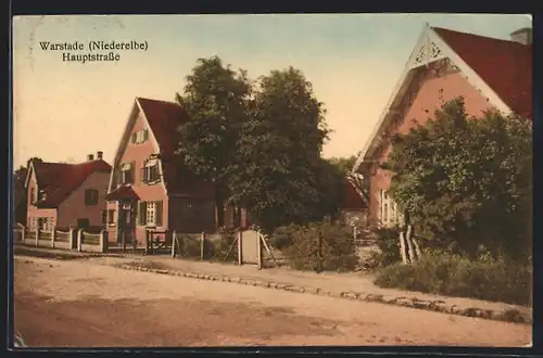 AK Warstade /Niederelbe, Hauptstrasse mit Bäumen