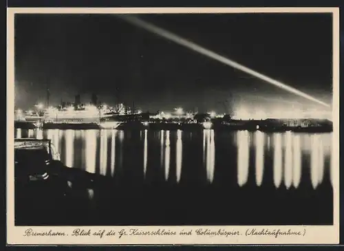 AK Bremerhaven, Blick auf die Gr.Kaiserschleuse und Columbuspier bei Nacht