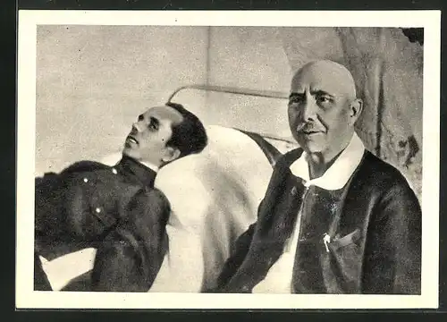 AK Nikolai A. Ostrowski auf dem Krankenbett mit Besucher
