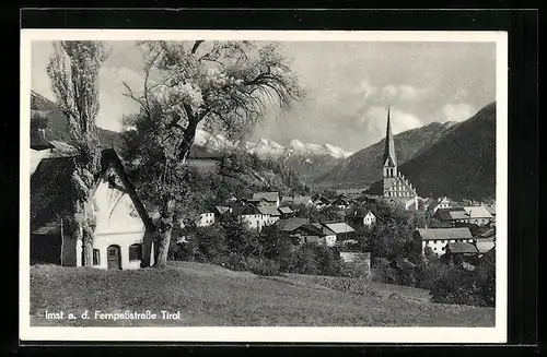 AK Imst a. d. Fernpassstrasse, Blick auf die Kirche im Ort